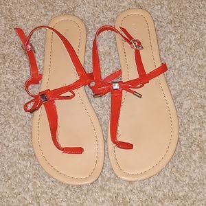 Red summer sandles with cute bow.